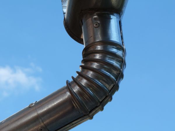 Metal Downspout Installation in Lansing